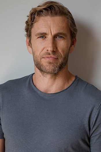 Photo of actor Brett Tucker