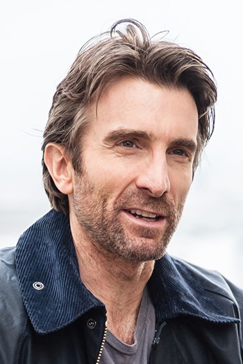 Photo of actor Sharlto Copley